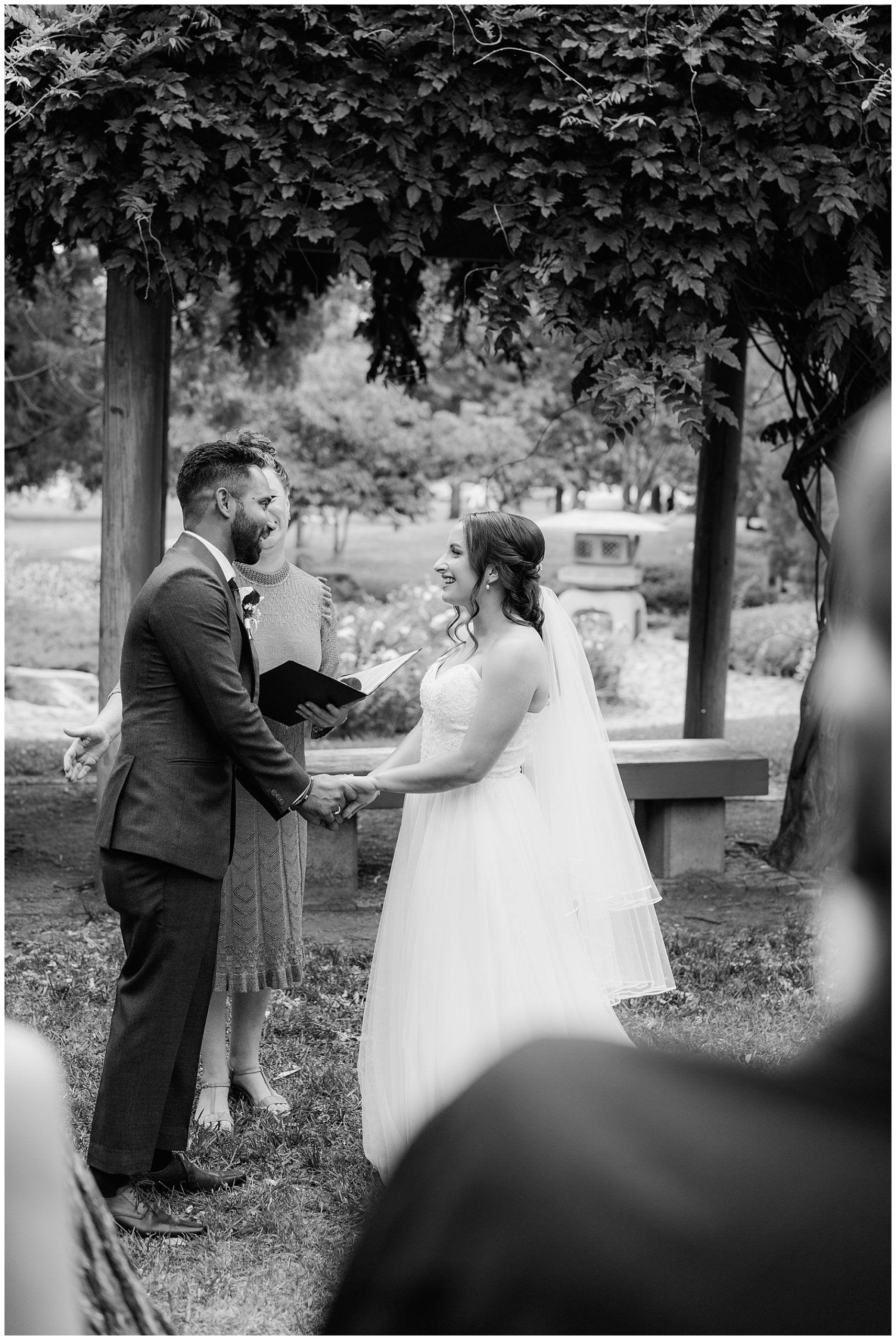 Bride and groom exchanging vows at their Lennox Gardens Elopement