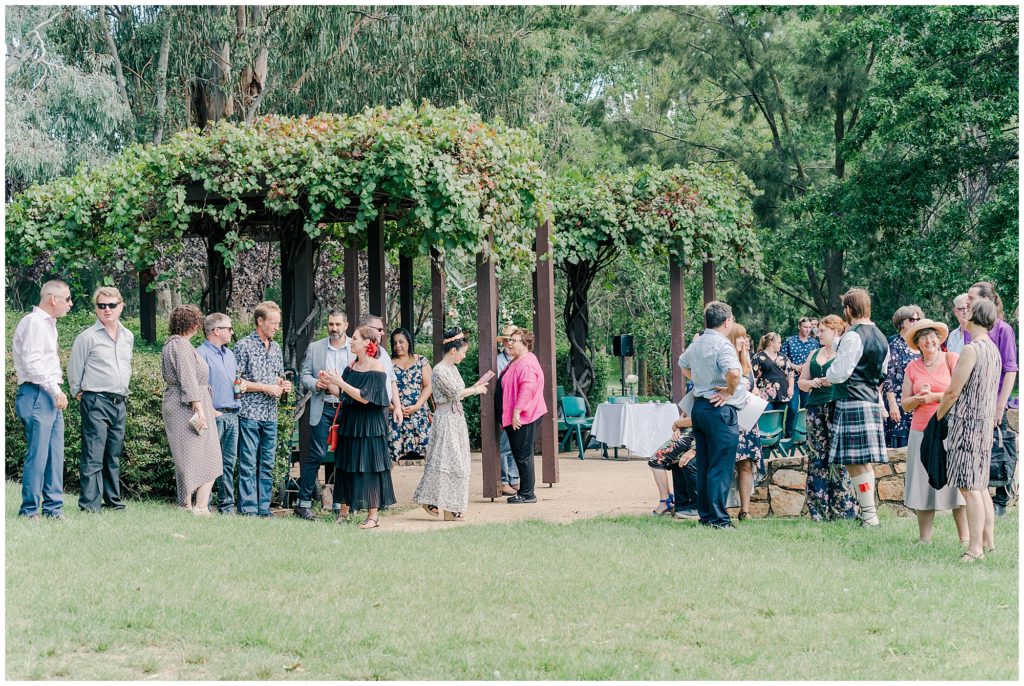 Wedding guests at a wedding in Canberra park