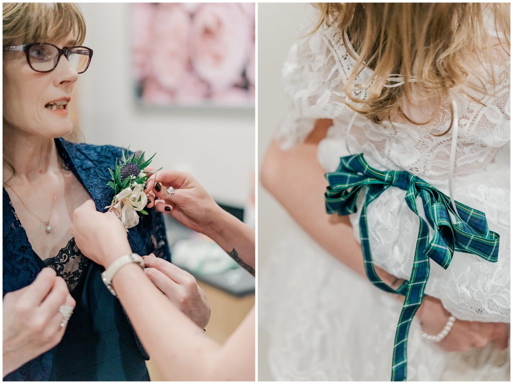 Bride pining the corsage on her mum 