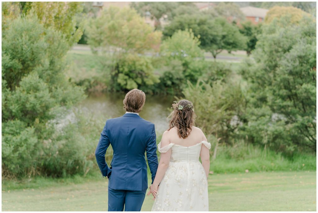 Bride and groom standing outdoors just before their Canberra Elopement  