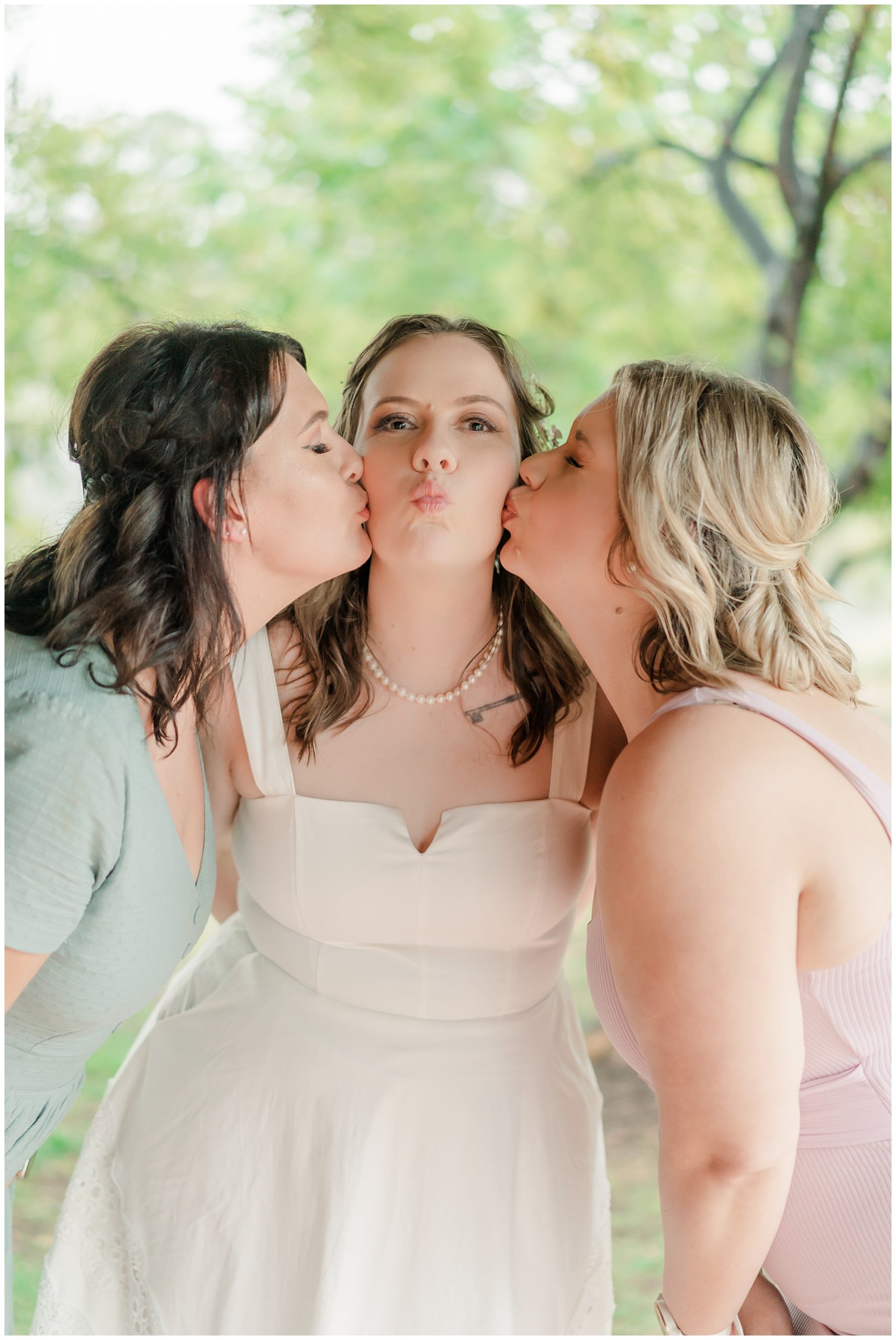 Bride having fun with her friends  on her wedding day 