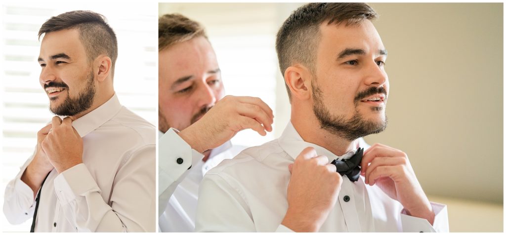 Groom putting on his tie before his wedding in Canberra