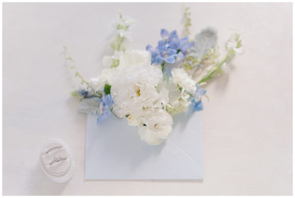 Wedding flowers in a dusty blue envelope 